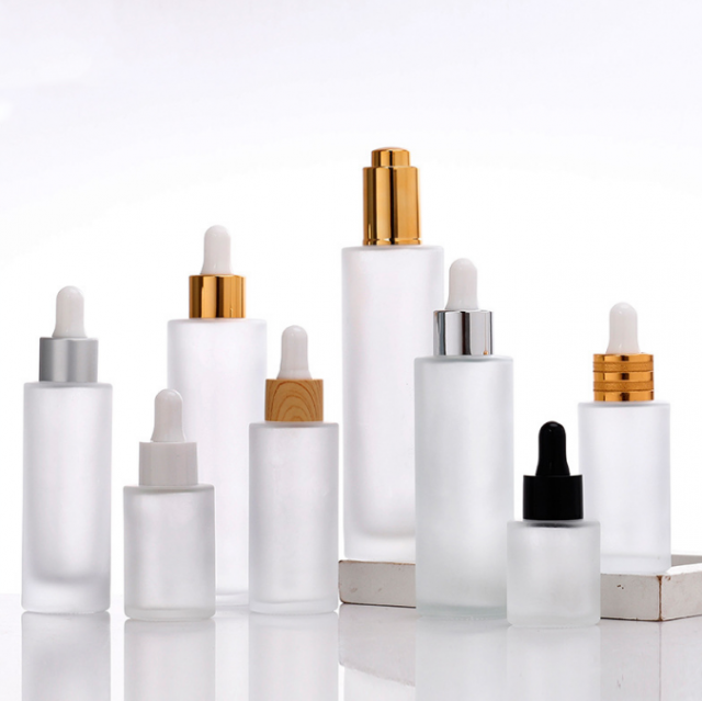 Flat shoulder cosmetic glass bottle